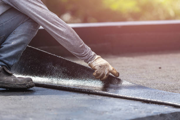 Professional Basement Waterproofing technician working in Ionia, MI